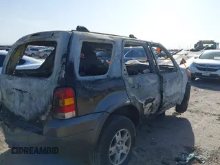2005 Ford Escape Limited с VIN 1FMYU94105KA90031, выставлен на аукционе IAAI как лот 41749186 с пробегом Не указан миль и . История ставок и продаж доступна на DreamBid. Изображение 4.