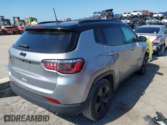 2021 Jeep Compass Altitude with VIN 3C4NJCBB5MT509187, listed as a IAAI auction lot 42021788 with 51,841 mi miles. Bid and sale history available at carsss.com. Image 4.