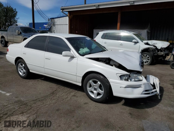 2000 Toyota Camry CE z VIN JT2BG22K2Y0479735, wystawiony jako Copart lot #50226755 z przebiegiem 282 694 mil mil oraz Nie do naprawy • Non repairable. Historia ofert i sprzedaży dostępna na DreamBid. Obrazek 4.