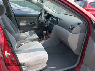 2004 Toyota Corolla CE with VIN 1NXBR32E14Z265397, listed as a IAAI auction lot 42182313 with 200,035 mi miles. Bid and sale history available at carsss.com. Image 5.