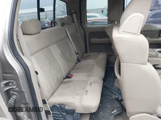 2004 Ford F-150 XLT with VIN 1FTPX14524NA34164, listed as a IAAI auction lot 41583236 with 168,780 mi miles. Bid and sale history available at carsss.com. Image 8.