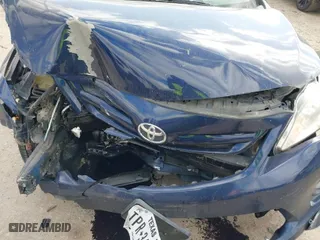 2012 Toyota Corolla L with VIN 5YFBU4EE8CP055279, listed as a IAAI auction lot 41781812 with 154,219 mi miles. Bid and sale history available at carsss.com. Image 6.