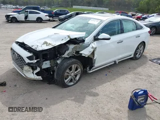2018 Hyundai Sonata SEL with VIN 5NPE34AF0JH642116, listed as a IAAI auction lot 41942709 with 52,621 mi miles and . Bid and sale history available at carsss.com. Image 2.