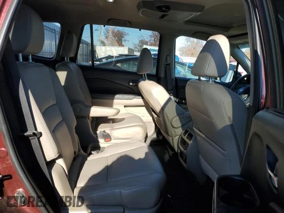 2020 Honda Pilot Touring 7-Passenger z VIN 5FNYF6H63LB004207, wystawiony jako Copart lot #81986794 z przebiegiem 98 454 mil mil oraz Szkoda całkowita • Salvage title. Historia ofert i sprzedaży dostępna na DreamBid. Obrazek 11.