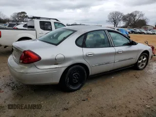 2000 Ford Taurus SE with VIN 1FAFP532XYA141783, listed as a Copart auction lot 43949795 with 203,939 mi miles and Salvage Title. Bid and sale history available at DreamBid. Image 3.
