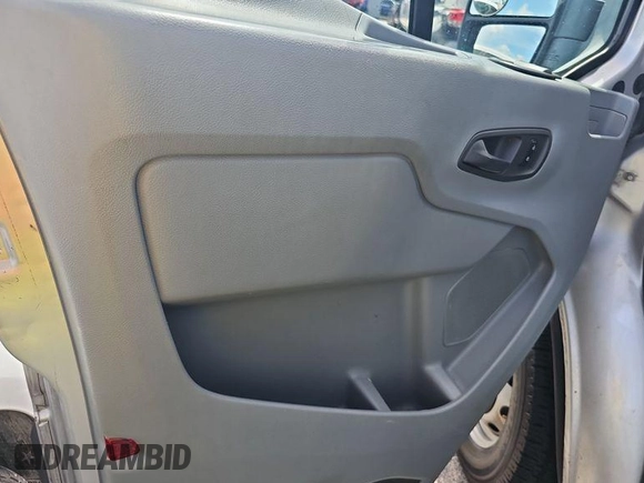 2017 Ford Transit Cargo z VIN 1FTYE1CMXHKA48291, wystawiony jako IAAI lot #42731289 z przebiegiem 142 973 mil mil oraz . Historia ofert i sprzedaży dostępna na DreamBid. Obrazek 29.