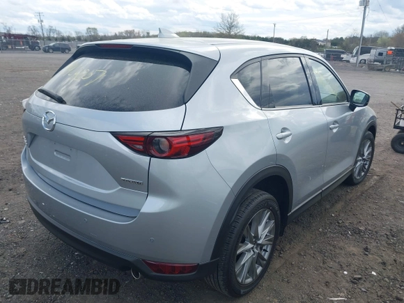 2021 Mazda CX-5 Grand Touring with VIN JM3KFBDM3M0354348, listed as a IAAI auction lot 41924207 with 45,786 mi miles. Bid and sale history available at carsss.com. Image 4.