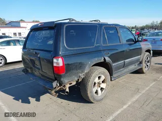 1998 Toyota 4Runner with VIN JT3GN87RXW0057693, listed as a IAAI auction lot 41863094 with 237,977 mi miles. Bid and sale history available at carsss.com. Image 4.