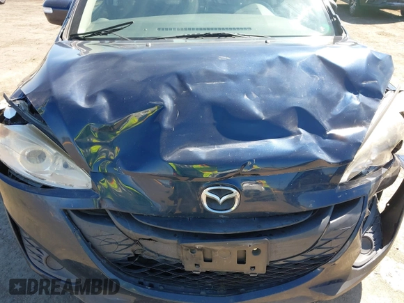 2014 Mazda 5 Sport with VIN JM1CW2BLXE0175975, listed as a IAAI auction lot 40278614 with 102,430 mi miles and . Bid and sale history available at DreamBid. Image 6.