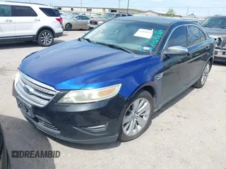 2011 Ford Taurus Limited with VIN 1FAHP2FWXBG146105, listed as a IAAI auction lot 42058941 with 160,142 mi miles and . Bid and sale history available at carsss.com. Image 2.
