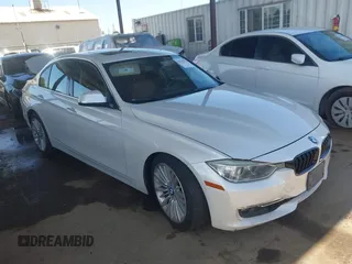 2013 BMW 3 Series 328i with VIN WBA3A5C54DF603211, listed as a IAAI auction lot 42541672 with 165,350 mi miles and . Bid and sale history available at DreamBid. Image 1.