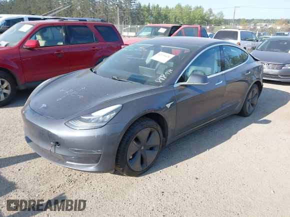 2018 Tesla Model 3 Long Range Battery with VIN 5YJ3E1EA1JF021139, listed as a IAAI auction lot 42116626 with 83,003 mi miles and . Bid and sale history available at DreamBid. Image 2.