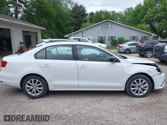 2015 Volkswagen Jetta SE z VIN 3VWD17AJ8FM323116, wystawiony jako IAAI lot #42246679 z przebiegiem 175 446 mil mil oraz . Historia ofert i sprzedaży dostępna na DreamBid. Obrazek 14.