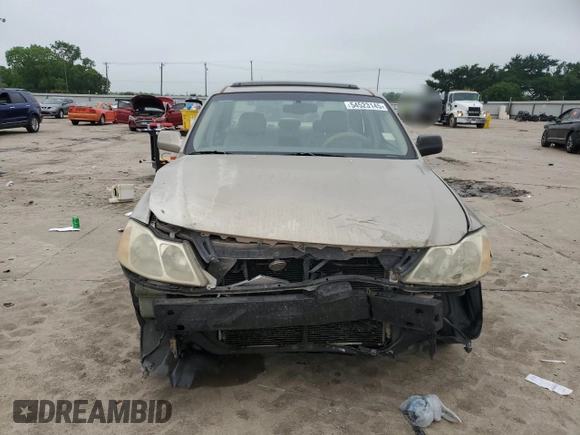 2000 Toyota Avalon XL z VIN 4T1BF28B7YU074685, wystawiony jako Copart lot #54523145 z przebiegiem 172 258 mil mil oraz Szkoda całkowita • Salvage title. Historia ofert i sprzedaży dostępna na DreamBid. Obrazek 5.