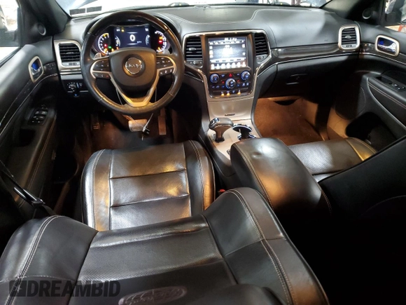 2014 Jeep Grand Cherokee Overland with VIN 1C4RJFCT9EC264594, listed as a Copart auction lot 50071695 with 124,712 mi miles and Clean Title. Bid and sale history available at DreamBid. Image 8.
