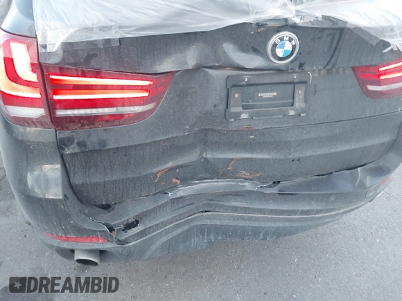 2015 BMW X5 xDrive35i with VIN 5UXKR0C59F0K59728, listed as a IAAI auction lot 41701083 with 83,267 mi miles. Bid and sale history available at carsss.com. Image 6.