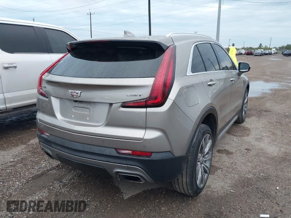 2022 Cadillac XT4 FWD Premium Luxury with VIN 1GYFZCR45NF164754, listed as a IAAI auction lot 41278705 with 65,698 mi miles. Bid and sale history available at carsss.com. Image 4.