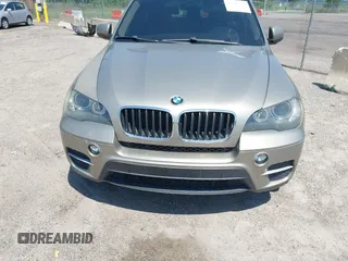 2011 BMW X5 35i z VIN 5UXZV4C57BL414643, wystawiony jako IAAI lot #42345726 z przebiegiem 123 819 mil mil oraz . Historia ofert i sprzedaży dostępna na DreamBid. Obrazek 6.