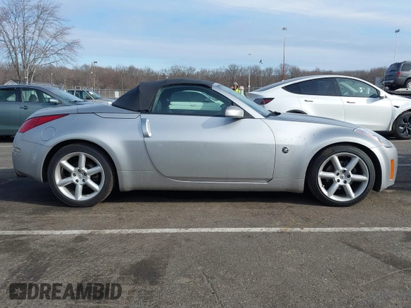 2005 Nissan 350Z Touring z VIN JN1AZ36A05M755776, wystawiony jako IAAI lot #41509506 z przebiegiem 79 148 mil mil oraz . Historia ofert i sprzedaży dostępna na DreamBid. Obrazek 13.