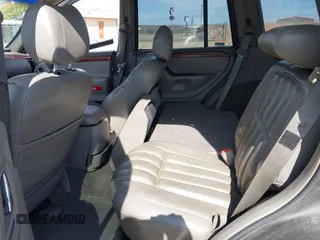 1999 Jeep Grand Cherokee Limited with VIN 1J4GW68N5XC773100, listed as a IAAI auction lot 41998432 with Not provided miles and . Bid and sale history available at DreamBid. Image 8.