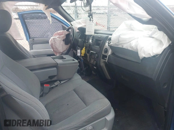 2014 Ford F-150 XL with VIN 1FTEW1CM1EKG07514, listed as a IAAI auction lot 41375171 with 217,758 mi miles. Bid and sale history available at carsss.com. Image 5.