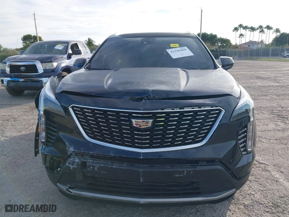 2020 Cadillac XT4 FWD Premium Luxury with VIN 1GYFZCR44LF070832, listed as a IAAI auction lot 41249608 with 77,471 mi miles. Bid and sale history available at carsss.com. Image 12.