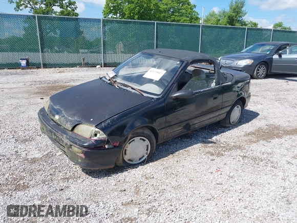 1993 Geo Metro z VIN JG1MR3363PK200242, wystawiony jako IAAI lot #42173417 z przebiegiem 151 862 mil mil oraz . Historia ofert i sprzedaży dostępna na DreamBid. Obrazek 2.