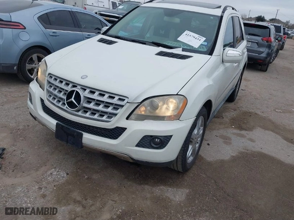 2009 Mercedes-Benz M-Class 3.5L with VIN 4JGBB86E69A445673, listed as a IAAI auction lot 41579434 with 200,449 mi miles. Bid and sale history available at carsss.com. Image 2.