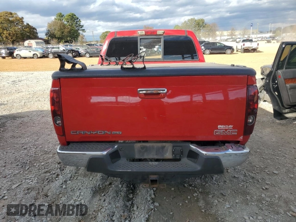 2012 GMC Canyon SLT with VIN 1GTH6NFE7C8105500, listed as a Copart auction lot 82255584 with 239,229 mi miles and Clean Title. Bid and sale history available at carsss.com. Image 6.