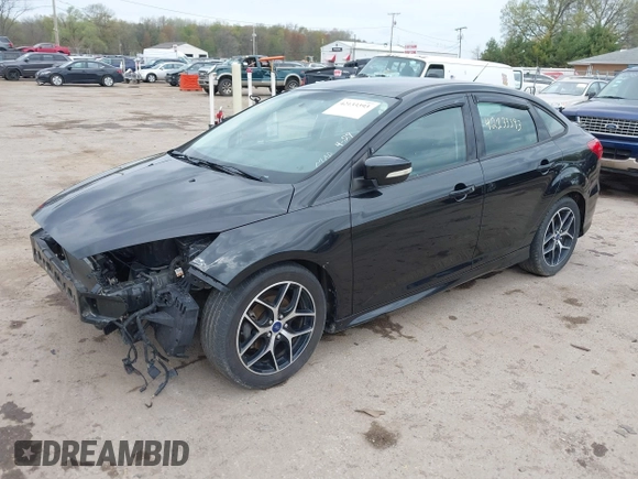 2015 Ford Focus SE with VIN 1FADP3F27FL386775, listed as a IAAI auction lot 42133393 with 102,960 mi miles and . Bid and sale history available at DreamBid. Image 18.