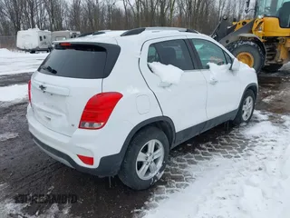 2020 Chevrolet Trax LT with VIN KL7CJLSB3LB072231, listed as a IAAI auction lot 41293558 with 58,297 mi miles and . Bid and sale history available at DreamBid. Image 4.
