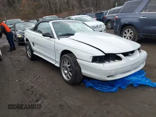 1996 Ford Mustang GT with VIN 1FALP45X7TF201553, listed as a IAAI auction lot 41487690 with 102,015 mi miles. Bid and sale history available at carsss.com. Image 1.