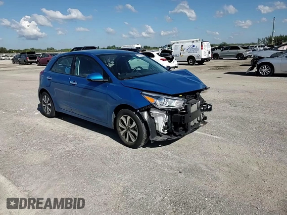 2023 Kia Rio S with VIN 3KPA25AD9PE548173, listed as a Copart auction lot 50232915 with 26,668 mi miles and Salvage Title. Bid and sale history available at DreamBid. Image 11.