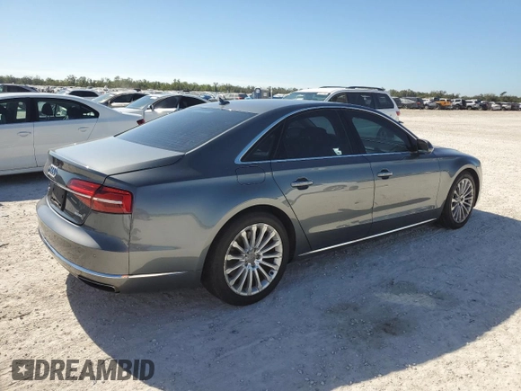 2015 Audi A8 with VIN WAUJGAFD5FN009026, listed as a Copart auction lot 81938904 with 122,880 mi miles and Salvage title. Bid and sale history available at DreamBid. Image 3.