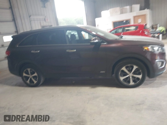 2016 Kia Sorento EX z VIN 5XYPHDA10GG019769, wystawiony jako IAAI lot #42567062 z przebiegiem 92 448 mil mil oraz . Historia ofert i sprzedaży dostępna na DreamBid. Obrazek 13.