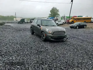 2014 MINI Countryman with VIN WMWZB3C59EWR42124, listed as a Copart auction lot 57830395 with 125,000 mi miles and Salvage title. Bid and sale history available at DreamBid. Image 15.