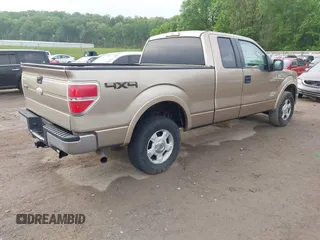 2011 Ford F-150 XL with VIN 1FTFX1ET0BFA88403, listed as a IAAI auction lot 42110763 with 185,801 mi miles. Bid and sale history available at carsss.com. Image 4.