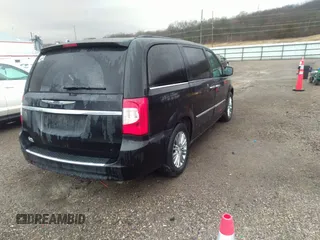 2015 Chrysler Town & Country Touring L with VIN 2C4RC1CG7FR539937, listed as a IAAI auction lot 41817807 with 158,400 mi miles and . Bid and sale history available at carsss.com. Image 4.