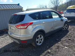 2014 Ford Escape SE with VIN 1FMCU9GX5EUD36442, listed as a IAAI auction lot 41984241 with 105,423 mi miles. Bid and sale history available at carsss.com. Image 4.