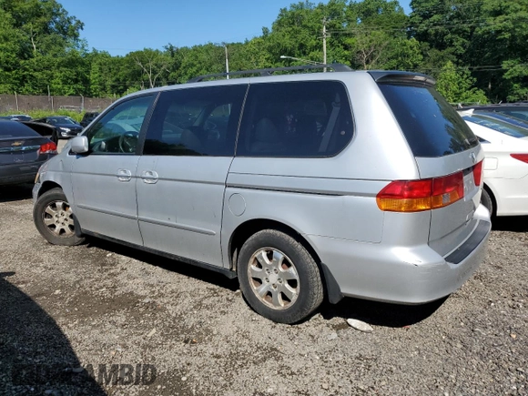 2003 Honda Odyssey EX-L z VIN 5FNRL18903B007639, wystawiony jako Copart lot #57230975 z przebiegiem 189 235 mil mil oraz Szkoda całkowita • Salvage title. Historia ofert i sprzedaży dostępna na DreamBid. Obrazek 2.