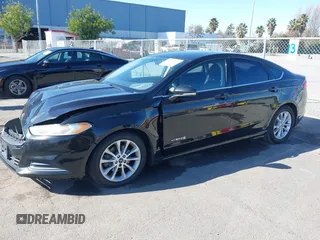 2015 Ford Fusion SE Hybrid with VIN 3FA6P0LU9FR294551, listed as a IAAI auction lot 41545007 with 179,906 mi miles. Bid and sale history available at carsss.com. Image 18.