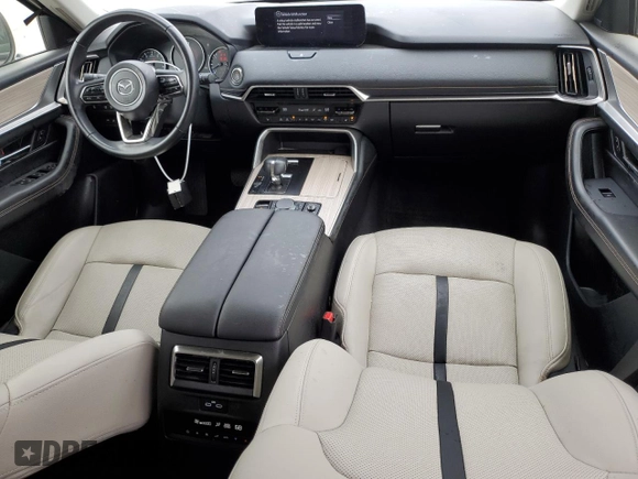 2024 Mazda CX-90 Premium z VIN JM3KKDHD8R1113467, wystawiony jako Copart lot #59140195 z przebiegiem 10 267 mil mil oraz Szkody całkowita. Historia ofert i sprzedaży dostępna na DreamBid. Obrazek 8.