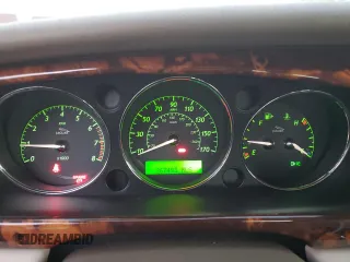 2004 Jaguar XJ with VIN SAJWA71C14SG16264, listed as a Copart auction lot 83251554 with 267,493 mi miles and Salvage Title. Bid and sale history available at carsss.com. Image 9.