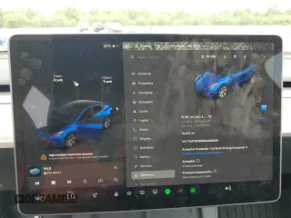 2024 Tesla Model Y Long Range z VIN 7SAYGDEE8RA248635, wystawiony jako Copart lot #59130125 z przebiegiem 21 210 mil mil oraz Szkoda całkowita • Salvage title. Historia ofert i sprzedaży dostępna na DreamBid. Obrazek 9.