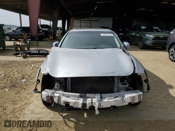 2009 Infiniti G37 Journey with VIN JNKCV61E59M306286, listed as a Copart auction lot 54976105 with 246,013 mi miles and Salvage Title. Bid and sale history available at DreamBid. Image 5.