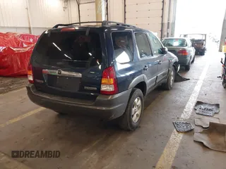 2003 Mazda Tribute LX with VIN 4F2YZ94193KM56345, listed as a IAAI auction lot 41200769 with 141,728 mi miles and . Bid and sale history available at DreamBid. Image 4.