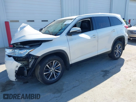 2019 Toyota Highlander SE with VIN 5TDJZRFH4KS568084, listed as a IAAI auction lot 41996726 with 88,892 mi miles and . Bid and sale history available at DreamBid. Image 2.