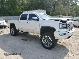 2017 GMC Sierra 1500 Denali z VIN 3GTU2PEJ2HG433669, wystawiony jako Copart lot #57460285 z przebiegiem 131 113 mil mil oraz Szkoda całkowita • Salvage title. Historia ofert i sprzedaży dostępna na DreamBid. Obrazek 4.