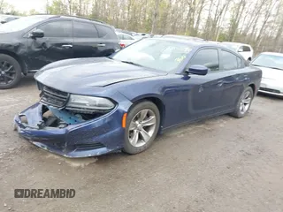 2015 Dodge Charger SXT with VIN 2C3CDXHG5FH878642, listed as a IAAI auction lot 42035569 with 228,000 mi miles and . Bid and sale history available at DreamBid. Image 2.