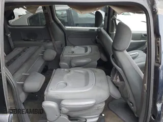 2005 Dodge Caravan SXT with VIN 1D4GP45RX5B416600, listed as a IAAI auction lot 42113088 with 312,418 mi miles and . Bid and sale history available at DreamBid. Image 8.